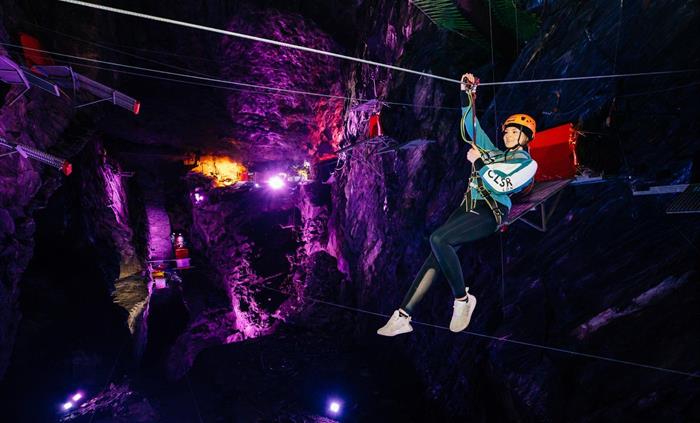 Take flight on 11 zip lines at Zip World Caverns